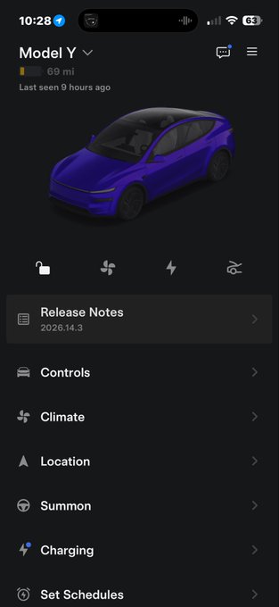 The image shows a blue car displayed on an iPhone screen, with the time shown as 10:28 am. The phone's settings menu is visible below the car image. The text "Sixty Niner" appears in the bottom right corner of the image.