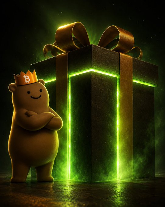 The image features a brown bear standing next to a large gift box with green lights coming from underneath, creating an ethereal glow around them. The caption reads "$GRIZZY will still surprise a lot of people." This suggests that the bear's presence and the glowing box might be surprising or unexpected for some viewers due to their unusual combination.

The image is likely related to Bitcoin, as it features a cartoon bear wearing a crown and standing next to a large gift box with green lights coming from underneath. The caption implies that the bear and the gift box could represent the concept of cryptocurrency or digital currency in a playful and creative way.