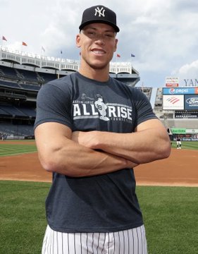 Aaron Judge, wearing a Yankees cap and an "All-Rise" t-shirt, poses at Yankee Stadium, connecting to the Polymarket post that reports a sharp wallet placing $40.6K on the Nationals in tonight's baseball game.