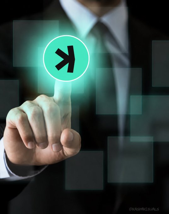 A stock photo of a businessman in a suit pointing his finger at a glowing green circular icon with an airplane symbol, with watermark '©KASP VISUALS'.