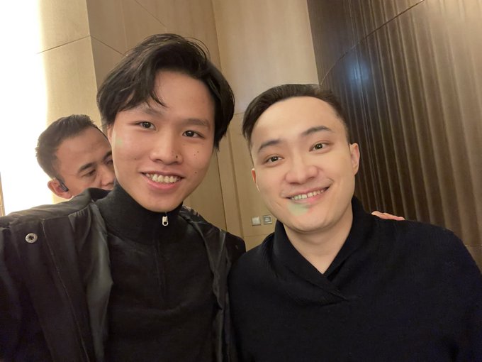 Two smiling men pose closely together for a selfie, appearing to celebrate a professional milestone, which aligns with the post expressing gratitude for htx's continued support of the project @insidersdotbot. The image conveys a sense of camaraderie and optimism that mirrors the message of perseverance through bearish market conditions.