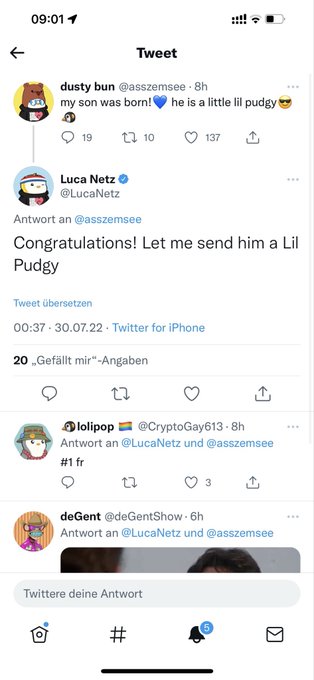 A Twitter screenshot showing a conversation between dusty bun (@asszemsee) announcing a new son and Luca Netz (@LucaNetz) offering to send him a Lil Pudgy NFT.