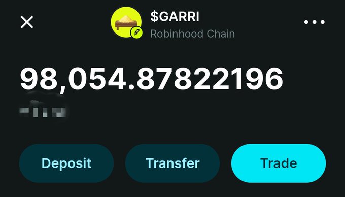 A digital wallet screen displays a balance of '98,054.87822196' for the token '$GARRI' on the Robinhood Chain, with Deposit, Transfer, and Trade buttons at the bottom.