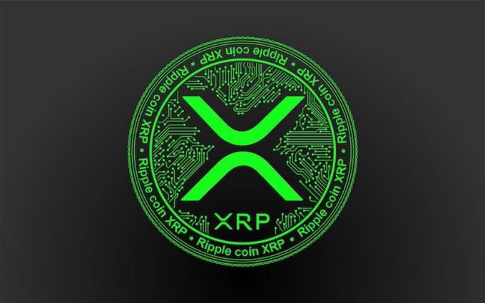 The image shows the green XRP (Ripple coin) logo displayed on a circuit board design, surrounded by text reading "Ripple coin XRP." It visually reinforces the post's bullish sentiment about buying the XRP dip, serving as a symbol of confidence in the cryptocurrency's future price recovery.