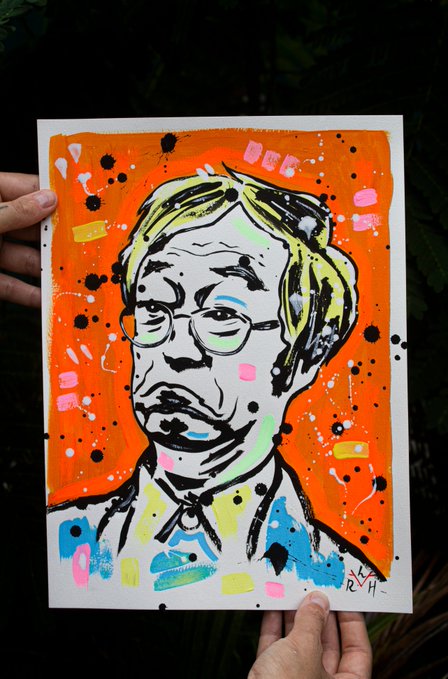An expressive pop-art style portrait painting of Donald Trump, signed 'RVA 24', held up against a dark background with paint splatters and vibrant colors.