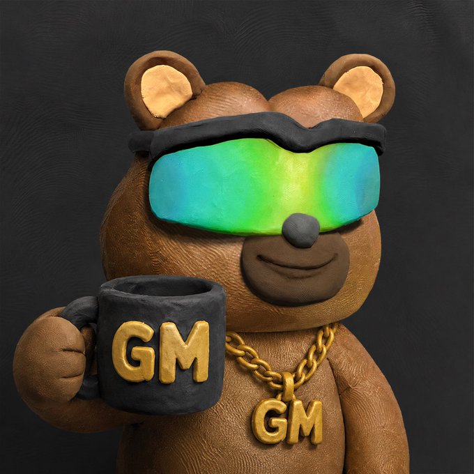 A 3D rendered brown bear character wearing a black sleep mask with iridescent green lenses holds a black mug with gold 'GM' letters, and wears a matching gold 'GM' chain necklace against a dark background.