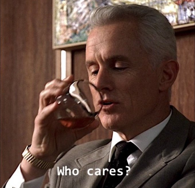 An older man in a gray suit and tie calmly sips from a glass while the caption "Who cares?" appears at the bottom of the screen. The dismissive expression and text contrast humorously with the post's question about an algorithm, capturing a mood of indifference or detachment.