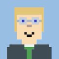 A pixel art avatar of a blonde man with blue eyes wearing a black suit and green tie against a blue background.