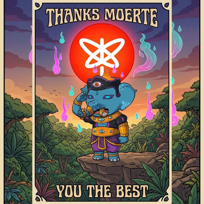 A tarot-style card illustration of a blue Ganesha figure with a white atomic symbol on a red sun, reading 'THANKS MOERTE' and 'YOU THE BEST'.
