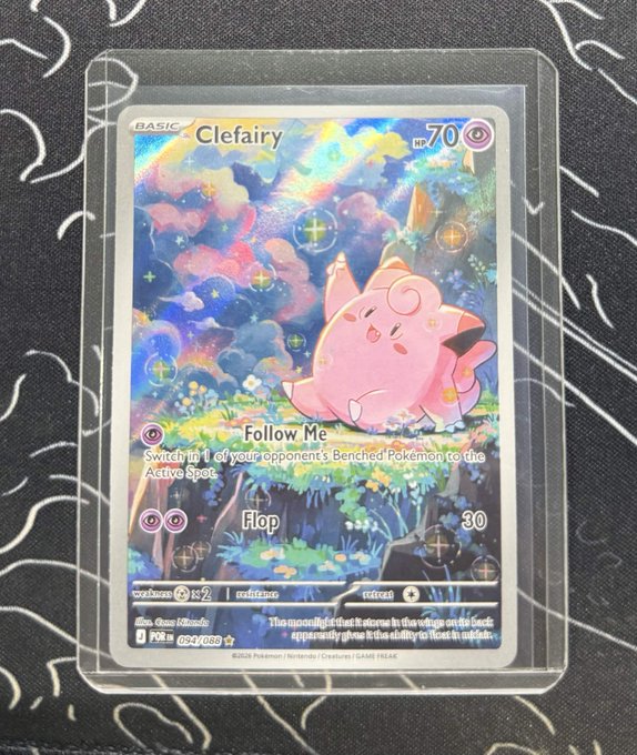 The image shows a holographic Pokémon trading card featuring Clefairy, labeled as a "BASIC" with 70 HP, displaying moves "Follow Me" and "Flop" (30 damage), and identified as an Illustration Rare from the Perfect Order set (094/098), protected in a clear sleeve—capturing the charming, kawaii vibe described in the post.