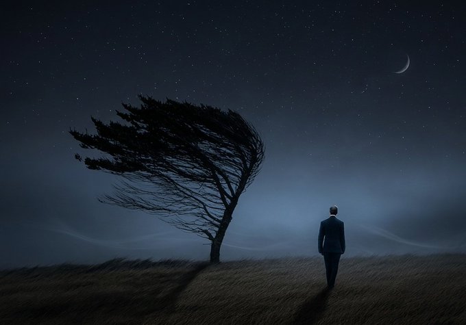 A surreal nighttime scene of a man in a suit walking toward a wind-blown tree under a starry sky with a crescent moon.