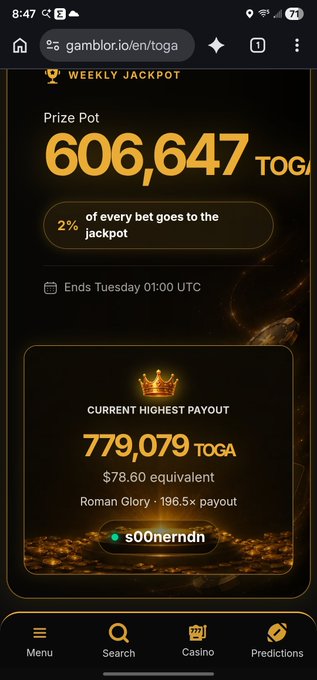 A screenshot from the website gamblor.io/en/toga showing a 'WEEKLY JACKPOT' prize pot of 606,647 TOGA and a current highest payout of 779,079 TOGA.