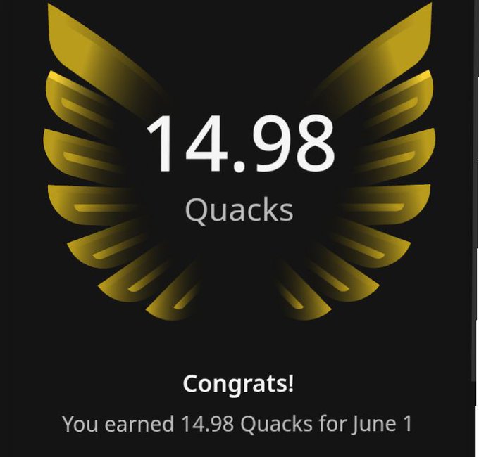 The image features a graphic that displays a gold logo with wings and a number of quacks in the center of it, accompanied by congratulations text below the logo. The background of the design is black, providing contrast for the elements within. The post appears to be a part of an Instagram page related to quacking or bird-themed content, as suggested by the use of the quack logo and number system in its message. The congratulatory text implies that users have either achieved something noteworthy in their projects or are being recognized for their work in this particular context.