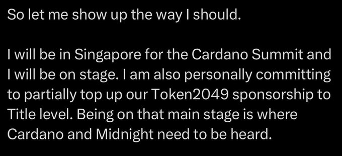 A black and white text message from Cardano, inviting the reader to join a summit in Singapore for the Cardano Summit and promising a title level of $20,000.