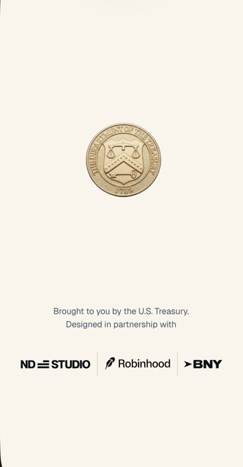 The image features a poster for an app called "Trump Account" that was created by the U.S. Treasury Department. The poster includes a gold coin with a shield design, which is the logo of the Trump account. The text on the poster reads "Brought to you by the U.S. Treasury", indicating that the app is designed for users who are interested in financial matters and have an interest in the policies implemented by the Trump administration.