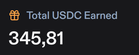 A dark dashboard panel titled "Total USDC Earned" displays the figure 345,81 next to an orange gift box icon.