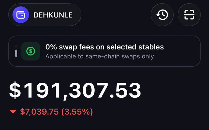 A digital wallet interface for 'DEHKUNLE' displaying a balance of $191,307.53, down $7,039.75 (3.55%), with a note about '0% swap fees on selected stables.'