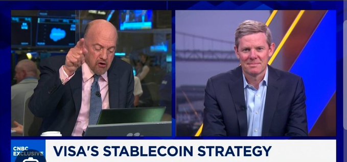 A CNBC Exclusive broadcast features two men in suits discussing 'VISA'S STABLECOIN STRATEGY', with one host gesturing while speaking.
