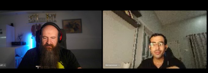 A split-screen video call showing a bald, bearded man wearing headphones on the left and a man with glasses labeled 'Mihaychenski' on the right.