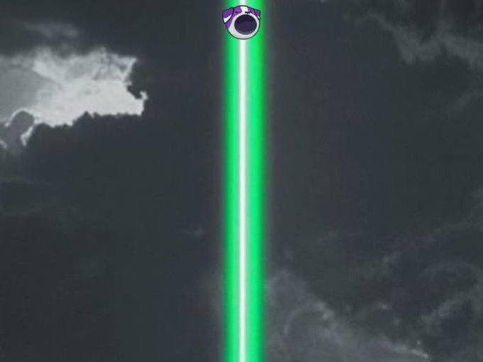 A green energy beam shooting upward into a cloudy sky from a purple and silver orb with horns.