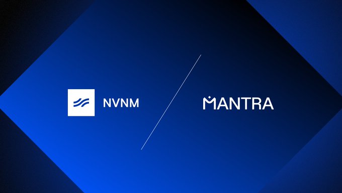 The image features a logo for the Native Utility token of the company @NVNM Chain. The logo consists of two blue diamonds, with the word "MANTRA" written above them. Below the logo, there's text that reads "Finally, @NVNM_Chain is cooking up its token launch and it’s as close as Q4 As the native utility token of NVNM Chain, MANTRA’s Layer 2, $NVNM will power verification 
and accountability activities on the chain. and MANTRA community will be first in line through". The image is a square with the logo at the center, surrounded by blue diamonds.
