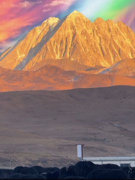 A majestic golden mountain is bathed in sunlight under a vibrant, rainbow-tinged sky, perfectly capturing the post's imagery of "golden mountain" and "seeing heaven and earth."