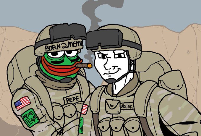 A cartoon illustration of two soldiers in military gear; the left soldier is a green Pepe frog labeled 'PEPE' with 'MEME TEAM' and 'BORN 2 MEME' text, smoking a cigar next to a smug Wojak labeled 'WOJAK'.