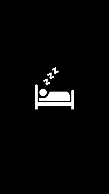 A simple black screen displaying a white minimalist icon of a person sleeping in a bed with 'zzz' symbols above them.