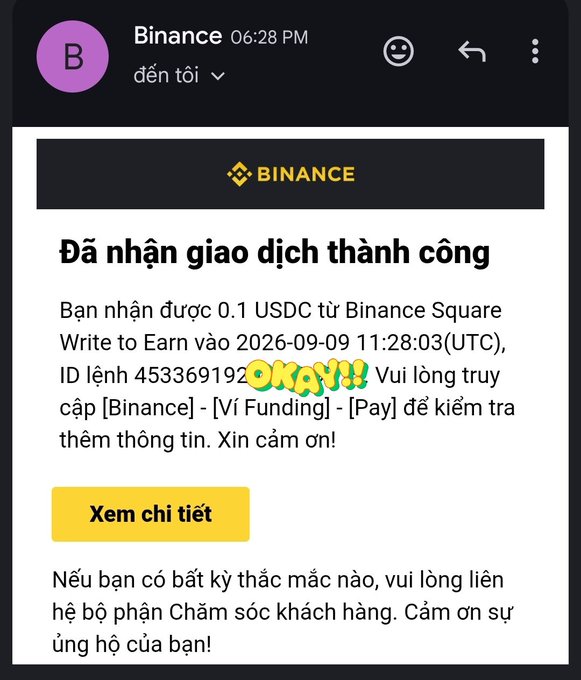 A screenshot of a Binance notification in Vietnamese confirming a successful transaction, stating the user received 0.1 USDC from Binance Square Write to Earn with 'OKAY!!' overlaid in playful text.