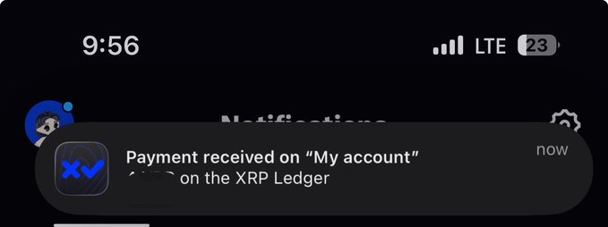 A smartphone notification reading 'Payment received on "My account" on the XRP Ledger' with the time 9:56 and an XRP wallet icon.