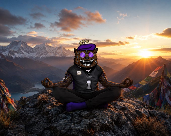 The image features a cartoon character wearing a football jersey sitting on top of a rock formation at sunset. The character appears to be in a meditative pose with their eyes closed, surrounded by mountains and a beautiful sunset. The caption above the image reads "Good Morning $XRP Army & Crypto Family Today is Sunday - the final day of the week. A day to slow down a little. A day to gather your thoughts, reflect on your goals, finish up the housework, spend time with family, visit God, enjoy the people who matter most both in real".