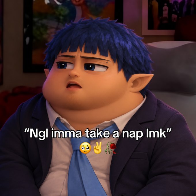 A 3D animated character with blue hair, a blue tie, and a suit sits on a couch with a tired expression. Text overlaid on the image reads 'Ngl imma take a nap lmk' accompanied by a sleepy emoji, peace sign, and rose emoji.