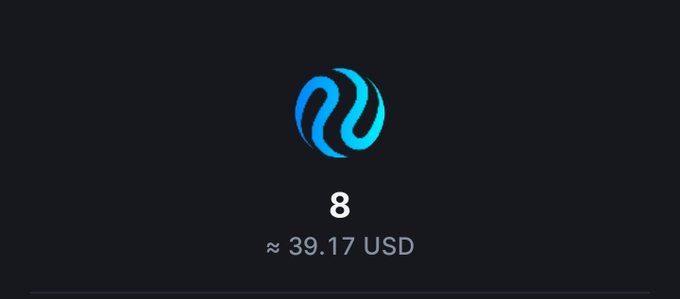 A dark screen displaying the Injective (INJ) logo with the number '8' and a price of approximately 39.17 USD.