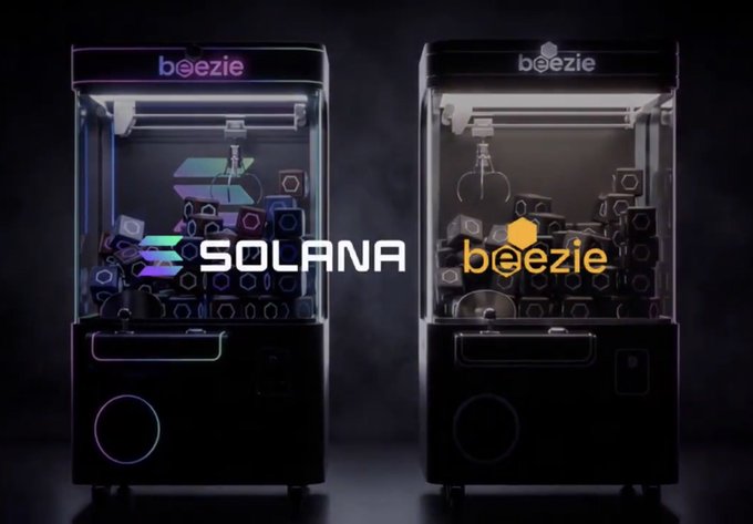 Two illuminated arcade-style vending machines branded with 'beezie' logos, displaying the 'SOLANA' and 'beezie' cryptocurrency branding prominently across the front.