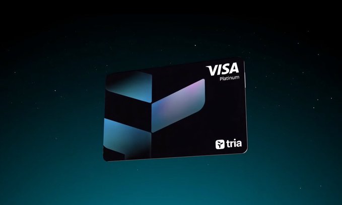 The image features a black Visa card floating in space against a blue background. The card has a unique design, resembling a pyramid shape, which makes it stand out from typical cards. The text "Visa" and "Premium" are clearly visible on the card, indicating its purpose as a payment method for premium services or rewards. The image also includes a caption that reads "Good morning The future of finance is shifting from simply holding assets to actually using them every day. More people want seamless spending, rewards, and self custody in one place instead of relying on outdated banking systems." This suggests that the card's design represents a modern approach to financial services, catering to the changing preferences of consumers who seek convenience and flexibility in their payment methods.