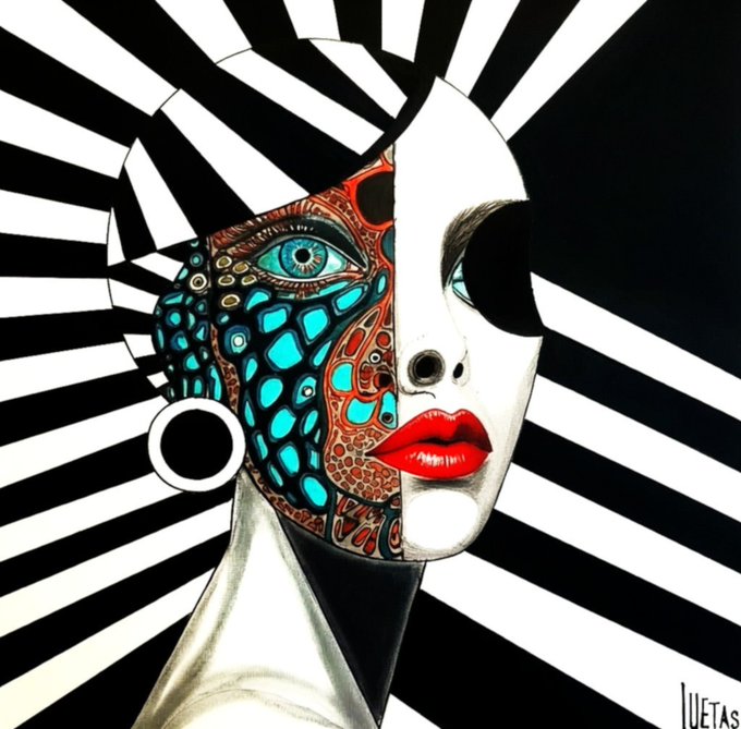 Stylized artwork of a woman's face split in half: the left side features turquoise mosaic patterns and red tribal designs around a green eye, while the right side is pale with red lips, set against a black and white sunburst background with the signature "JUETAS".