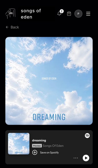 A screenshot of the Spotify app displaying an album titled 'Dreaming' by the artist 'Songs Of Eden', featuring a serene cover image of blue skies and white clouds.