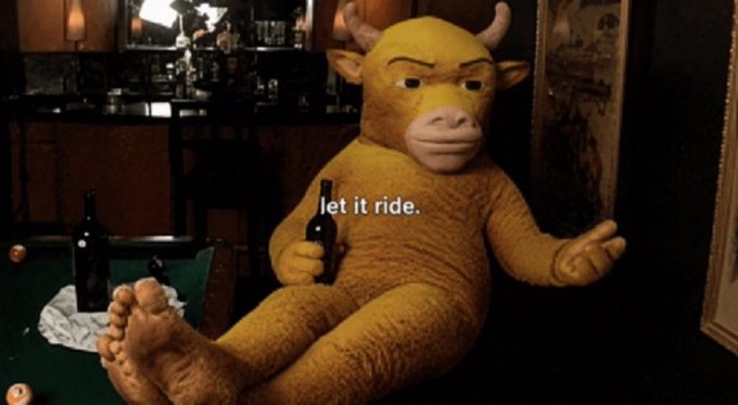 A humorous meme image featuring the yellow Muppet character 'Moose' sitting in a dimly lit room holding a beer bottle with the caption 'let it ride.'