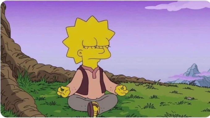 A cartoon image of Lisa Simpson from The Simpsons sitting cross-legged on grass in a meditative pose with her eyes closed.