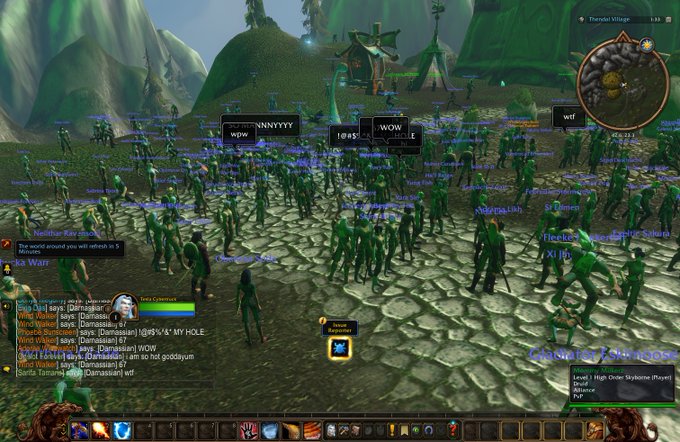 A World of Warcraft screenshot showing numerous player characters with chat text including 'wtf' and 'WOW' overlaid on a green landscape.