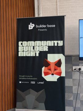 A vertical banner reading "builder base Presents COMMUNITY BUILDER NIGHT" featuring a stylized orange fox logo and event details.