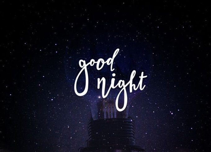 White cursive text reading 'good night' is displayed against a backdrop of a starry night sky with a dark building silhouette at the bottom.