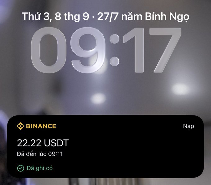 A smartphone lock screen showing the time 09:17 on Thursday, September 8th, with a Binance notification confirming a deposit of 22.22 USDT.