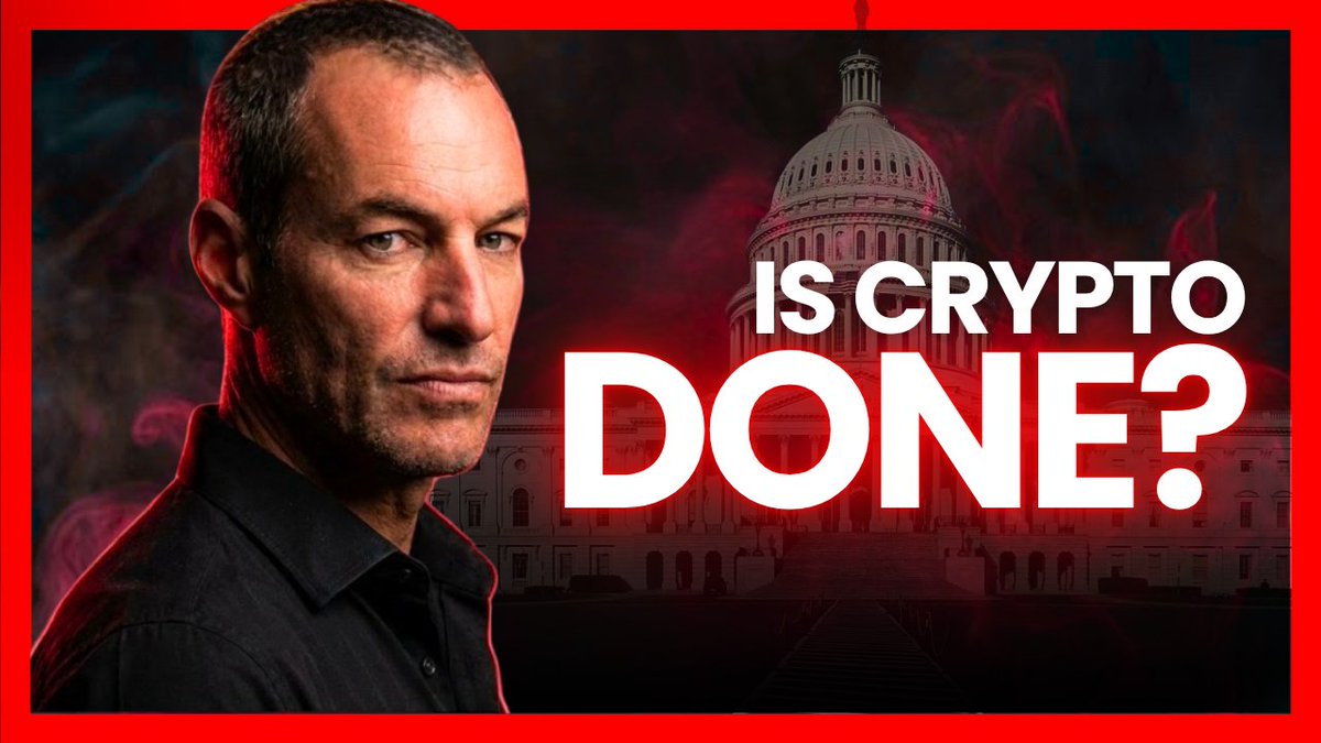 A man in a dark shirt standing in front of the U.S. Capitol building with a red background, featuring the text 'IS CRYPTO DONE?'.