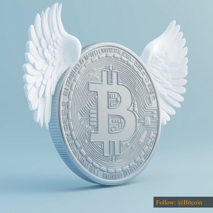 A 3D-rendered white Bitcoin coin adorned with angel wings is displayed against a soft blue background, with "Follow: @Bitcoin" text at the bottom. The winged coin visually symbolizes Bitcoin's soaring rise to the $63,272.30 price point mentioned in the post.