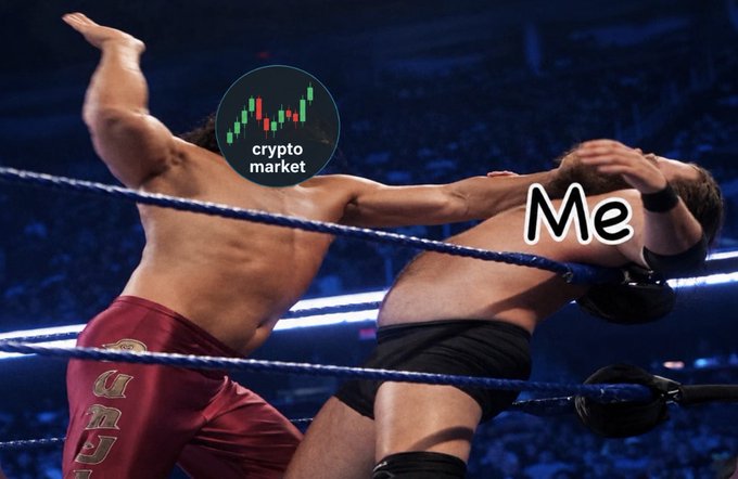 A humorous wrestling meme showing a wrestler getting body-slammed in a ring, with the "crypto market" labeled as the one delivering the slam and "Me" labeled as the wrestler taking the hit, referencing the beating crypto traders take from market volatility.