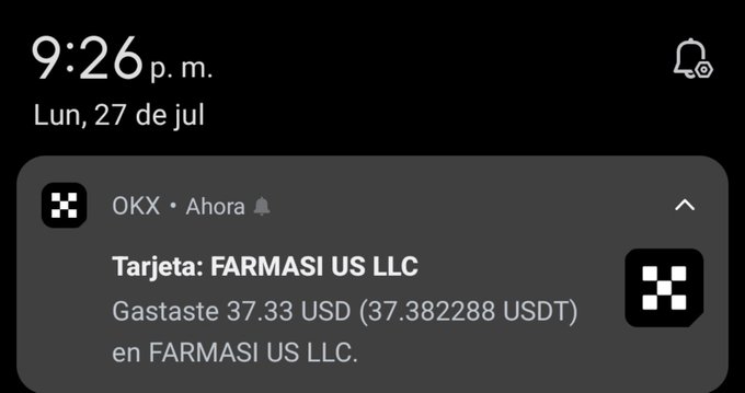 A phone notification screenshot in Spanish showing an OKX card transaction: 'Gastaste 37.33 USD (37.382288 USDT) en FARMASI US LLC' at 9:26 p.m. on Monday, July 27.