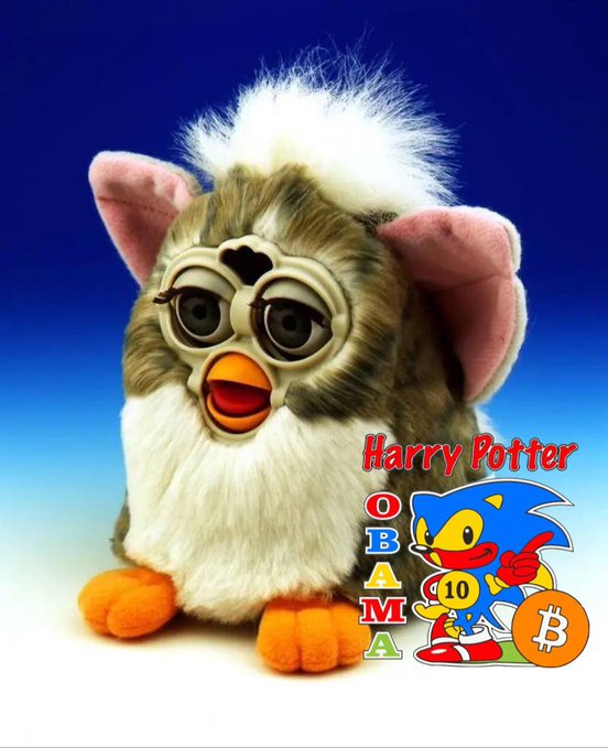 A Furby toy dressed as Harry Potter with round glasses is displayed next to a Sonic the Hedgehog graphic featuring the text "Harry Potter OBAMA" and a Bitcoin logo.