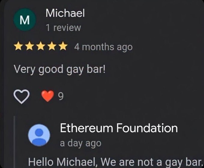 A Google review exchange where Michael left a 5-star review stating 'Very good gay bar!' and the Ethereum Foundation replied, 'Hello Michael, We are not a gay bar.'