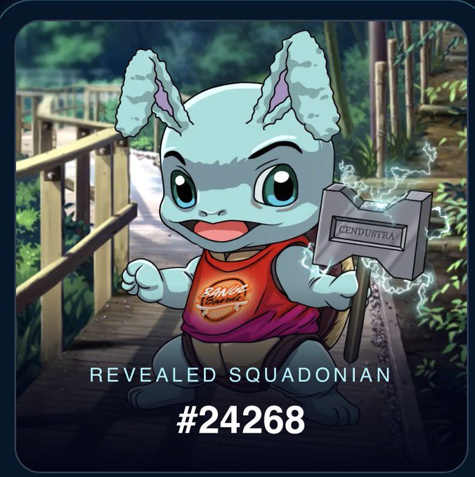 A 'Revealed Squadonian' NFT (#24268) featuring a blue cartoon creature with tall ears holding a hammer labeled 'CENDUBTRX' and wearing a 'Sauce' shirt.